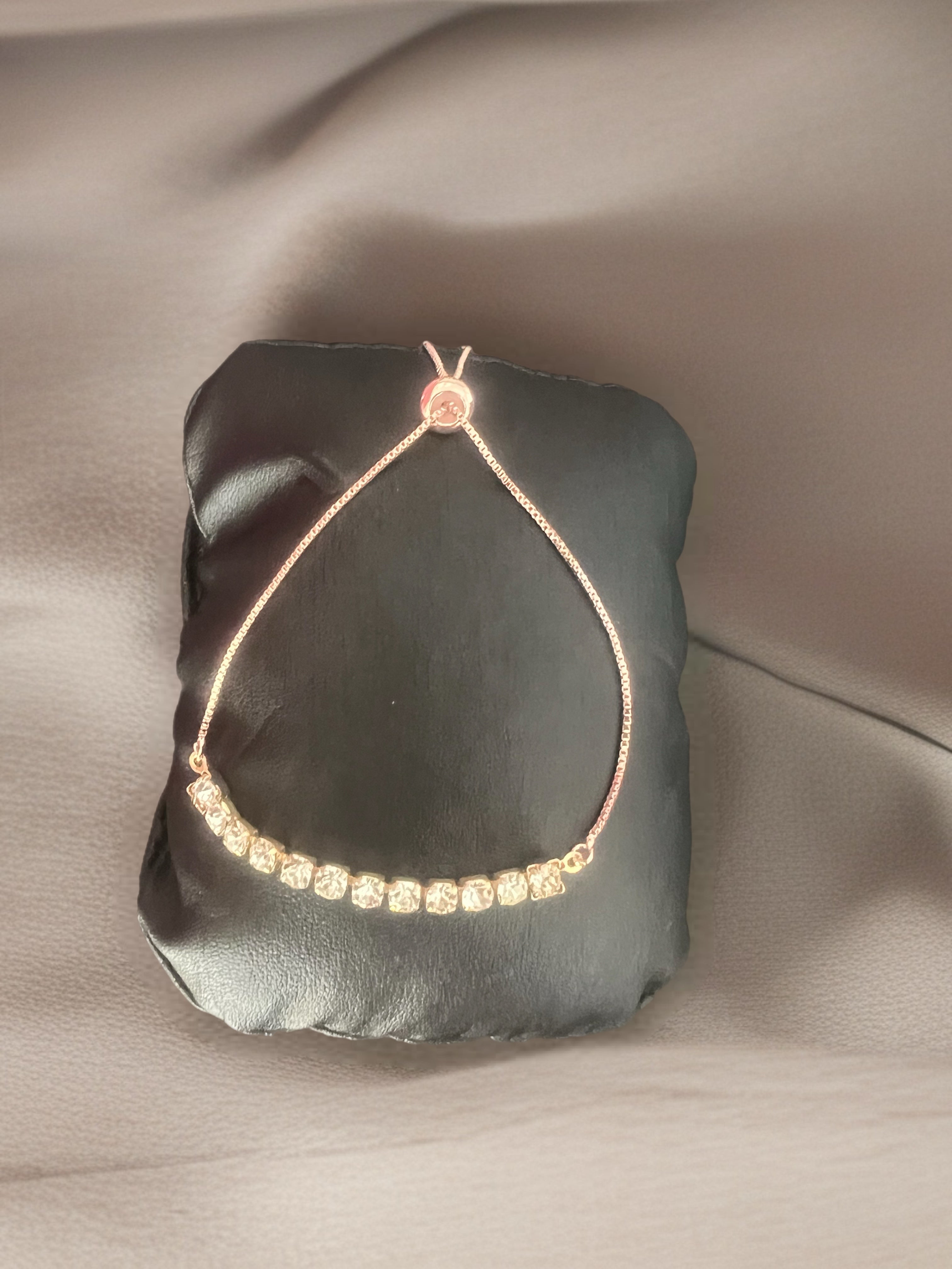 BRACCIALE A SCORRIMENTO ORO ROSA E STRASS