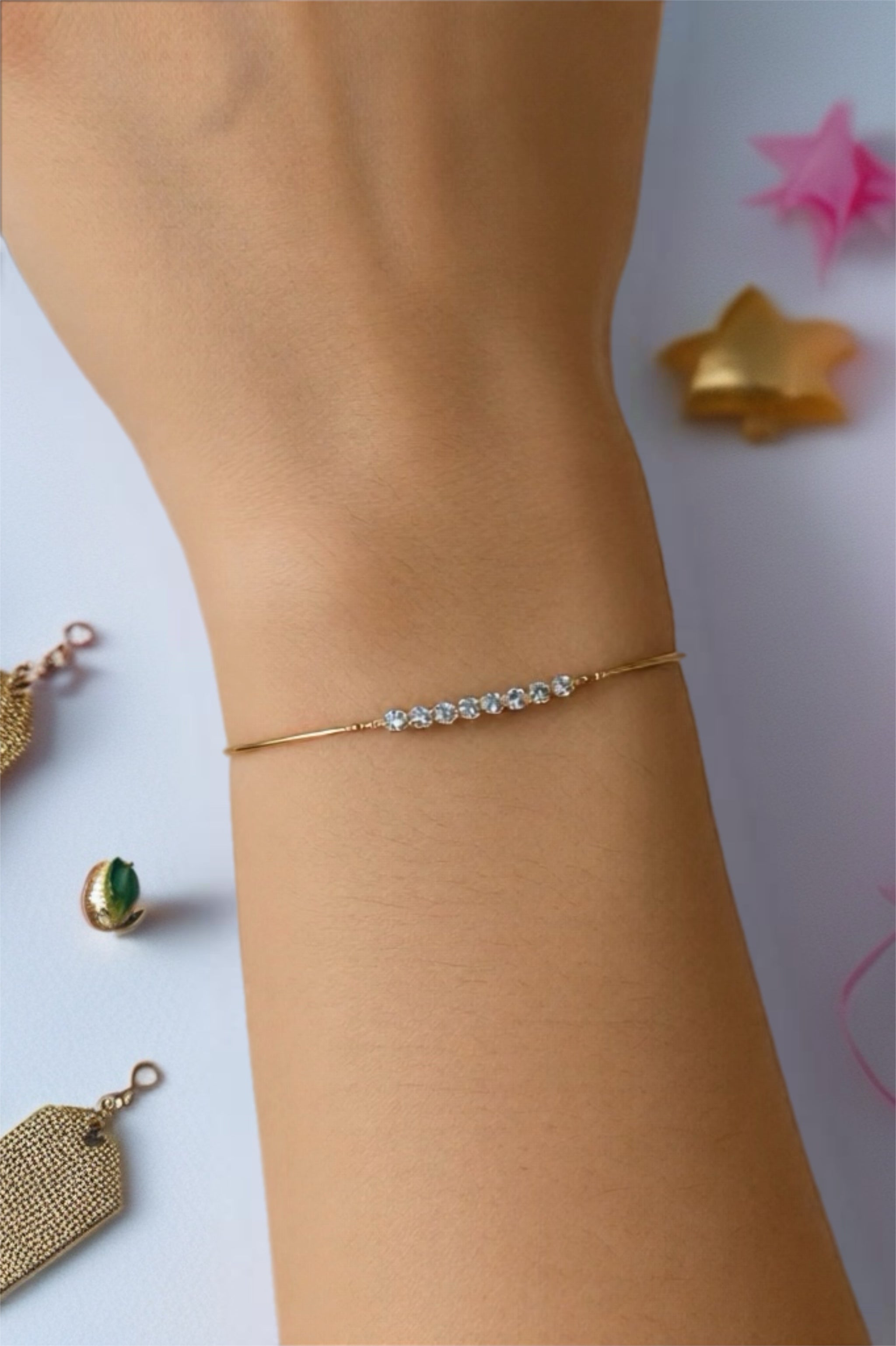 BRACCIALE A SCORRIMENTO ORO ROSA E STRASS